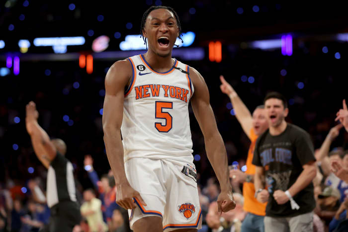 Apr 21, 2023; New York, New York, USA; New York Knicks guard Immanuel Quickley (5) reacts after a three point shot during the fourth quarter of game three of the 2023 NBA playoffs against the Cleveland Cavaliers at Madison Square Garden. Mandatory Credit: Brad Penner-USA TODAY Sports